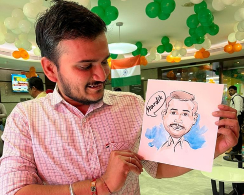Man holding a drawing - Life at Anand Rathi Global Finance
